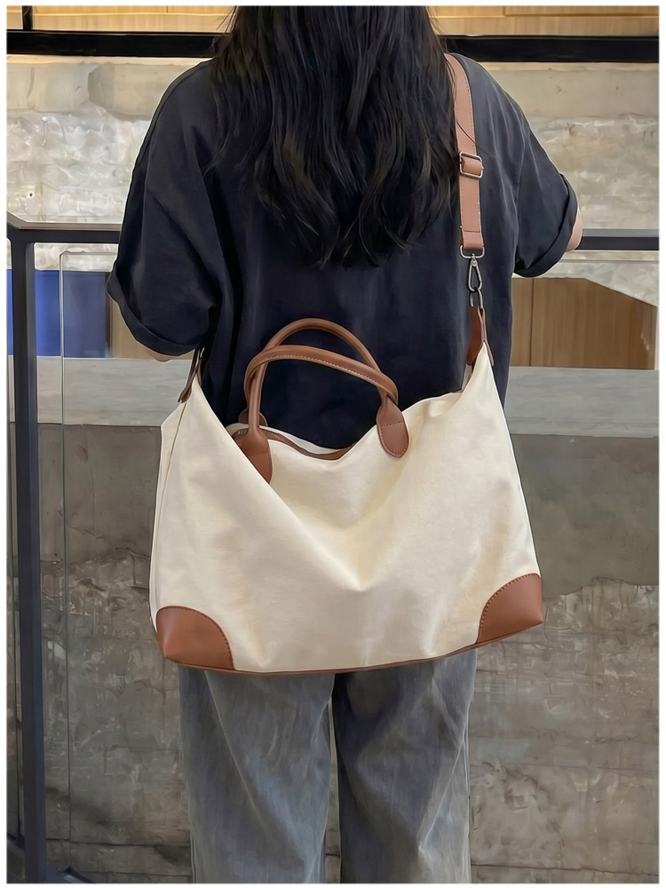 Thickened and durable washed canvas travel bag, large capacity crossbody bag, overnight bag for short trips, gym/yoga bag, back-to-school luggage bag detail 2