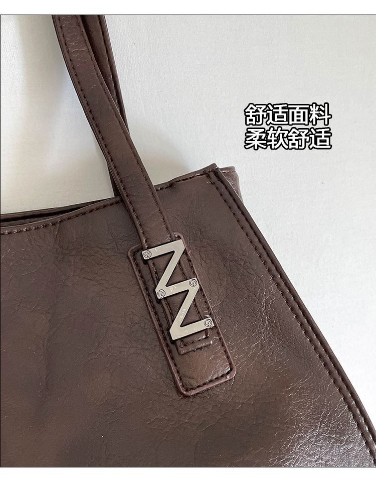 Elegant Women's Leather Bag: Spacious Travel Bag & Daily Essentials Organizer detail 1