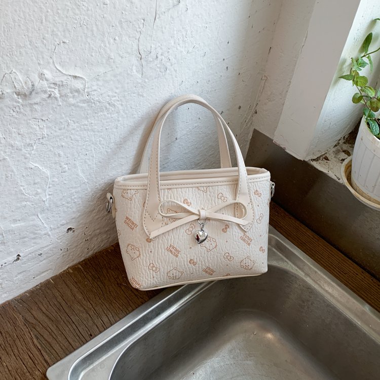 Women's PU Leather Bow Textured Top Handle Crossbody Bag view 3