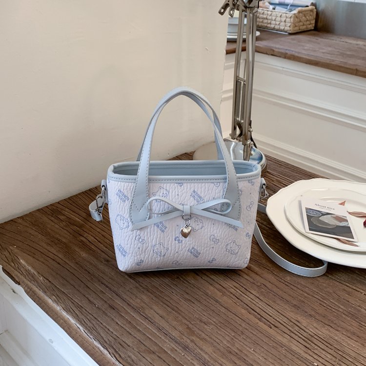 Women's PU Leather Bow Textured Top Handle Crossbody Bag view 5