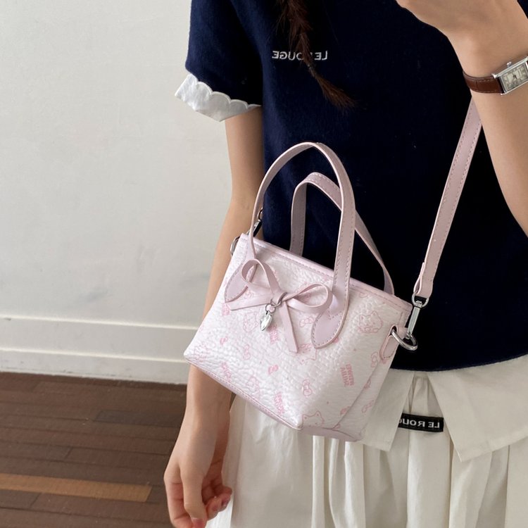Women's PU Leather Bow Textured Top Handle Crossbody Bag view 1