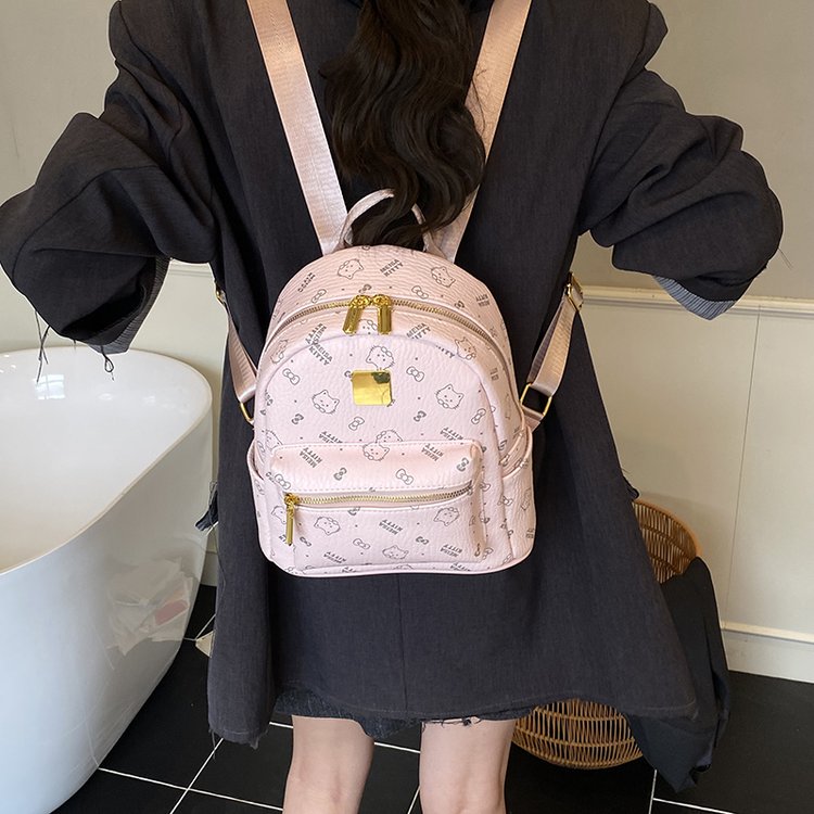 Women's PU Leather Monogram Mini Backpack view 1